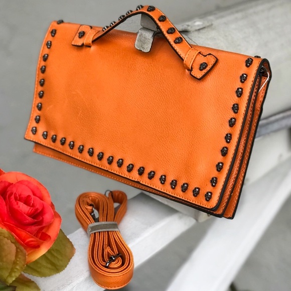 Handbags - Orange Crossbody Clutch Trimmed with Metal Skulls